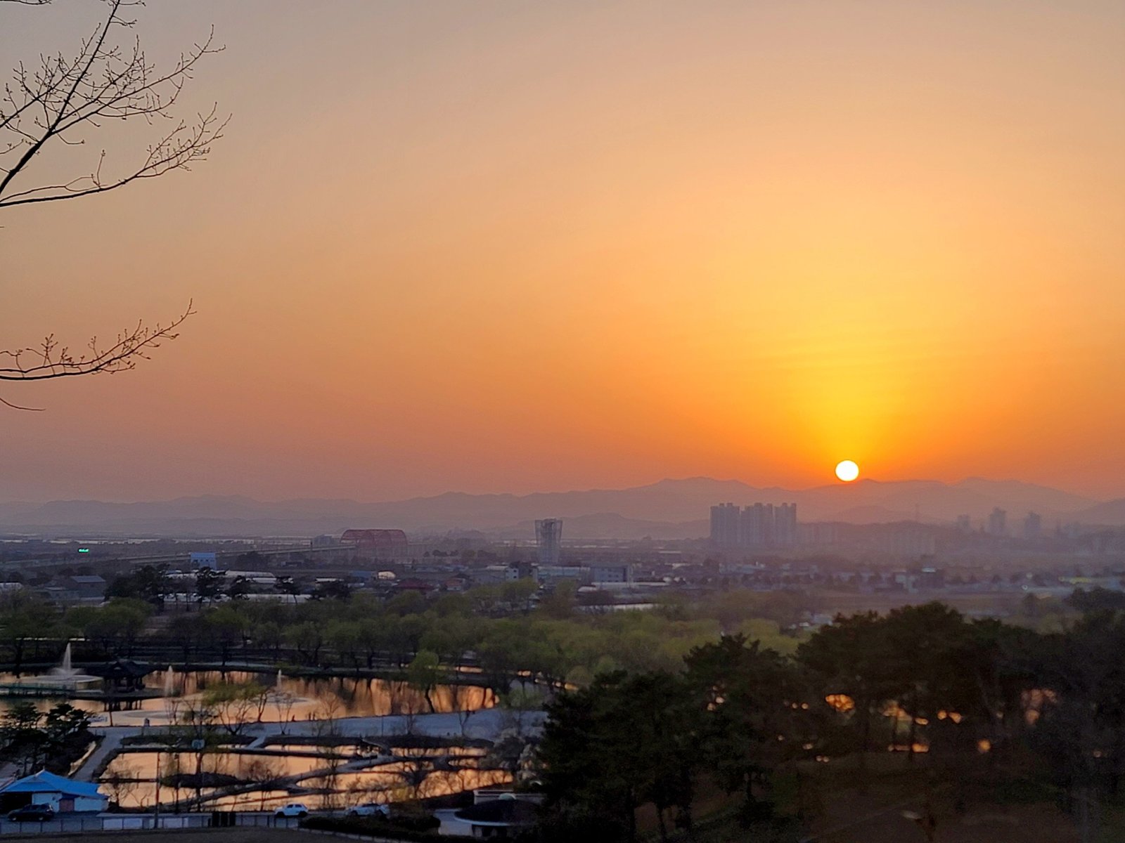 Sunset over Buyeo and the Gungnamji ponds seen from a hill